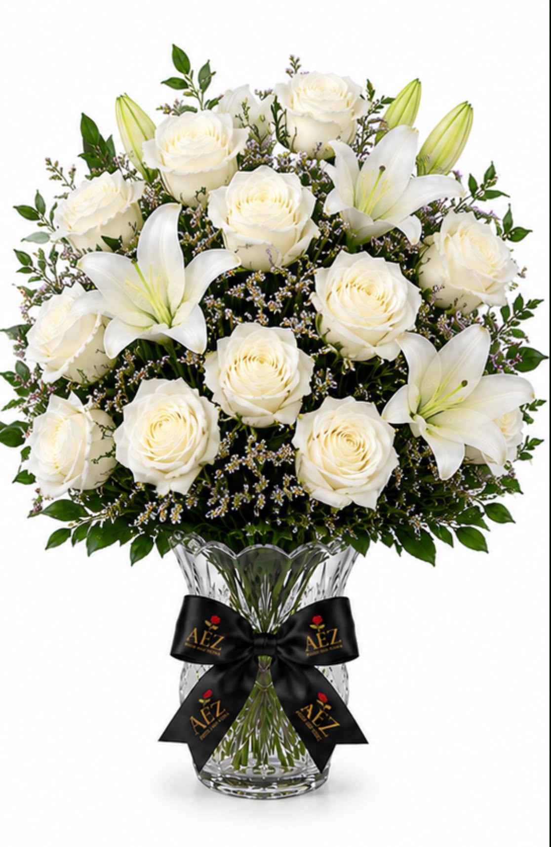Ivory rose & lily centerpiece for a summer wedding