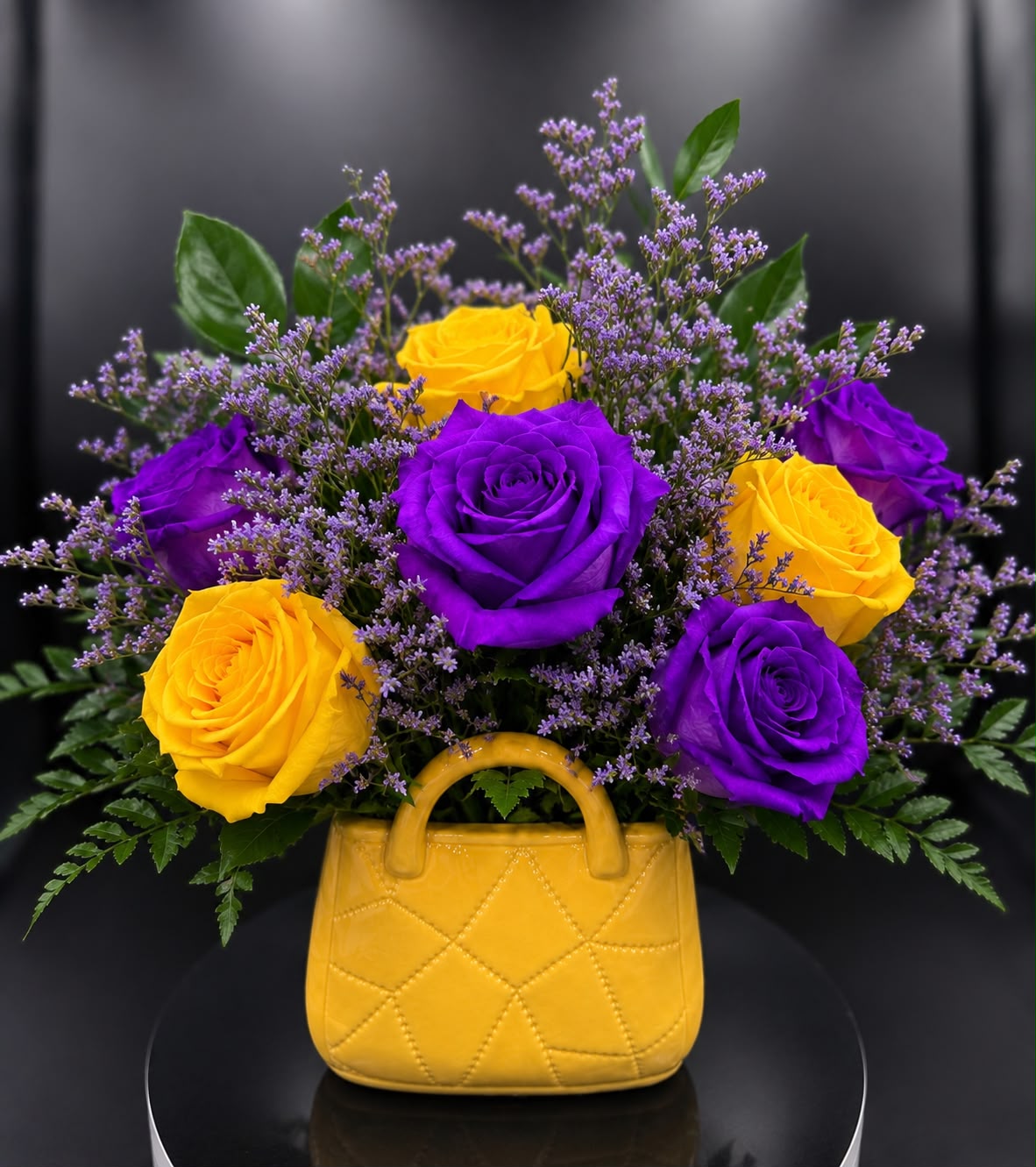 Purple & gold arrangement for a corporate gala
